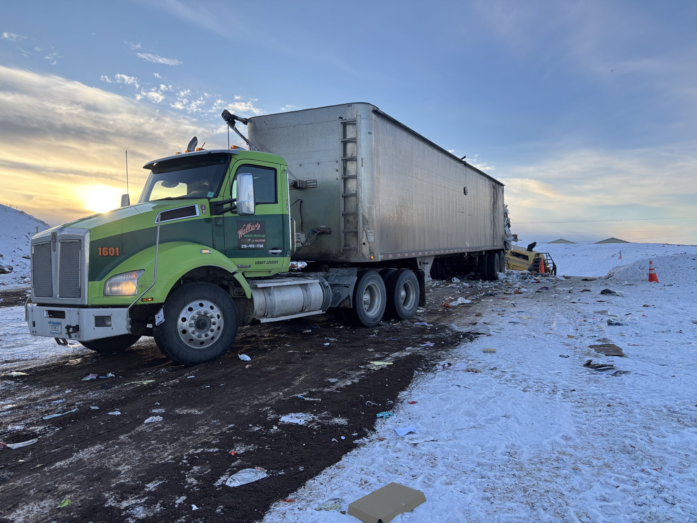 Walter's tractor-trailer at the landfill at sunset